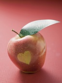 Red apple with heart