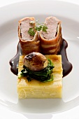 Lamb fillet wrapped in ham and potato gratin