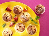 Several strawberry muffins