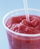 Strawberry smoothie with straw