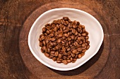 Roasted coffee beans in a dish