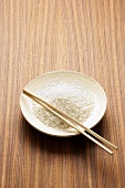 Dish of rice with chopsticks