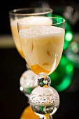Tropical Cocktail (made with peach, milk, rum, vodka & syrup)