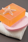 Soap with sponge and towel