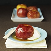 Glazed apple with cream and caramel sauce