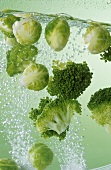 Brussels sprouts and broccoli in cooking water