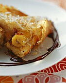 Baked banana in pastry with coconut and chilli