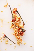 Chilli seeds and stalks on a board