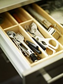 Various kitchen utensils in a drawer