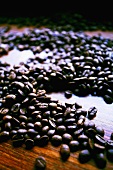 Coffee beans on wooden background