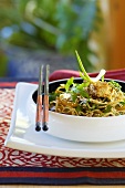 Fried noodles with sesame tofu and spring onions