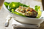 Aubergine stuffed with tomatoes, feta and olives