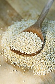 Quinoa with a wooden spoon