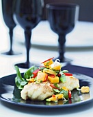 Fish fillet with mango and mint salad
