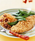 Turkey escalope in nut coating with cranberry couscous