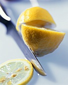 Lemon Cut in Half with Knife
