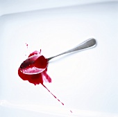 Splattered Berry Sauce on Spoon