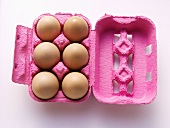 Half Dozen Brown Eggs in Pink Carton