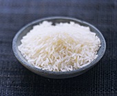 A Bowl of Uncooked Long Grain White Rice