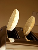 An English Muffin Popping from a Toaster