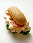 A Turkey Sub with Tomatoes, Cheese and Lettuce