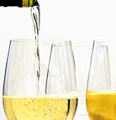 Pouring White Wine into Glass