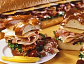 Ham, Turkey and Roast Beef Sandwich with Pickle; Sandwiches