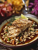 Grilled fish fillet on bean sauce