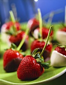Chocolate-dipped strawberries & strawberry with long stalk