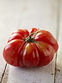 Single Heirloom Tomato on Wood