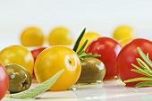 Cherry tomatoes, olives, sage and rosemary