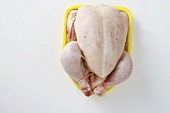 A ready-to-roast chicken, seen from above