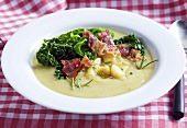 Celery soup with bacon and savoy cabbage