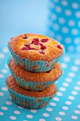 A stack of three redcurrant muffins