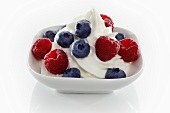 Yogurt ice cream garnished with fresh berries