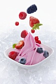 Berry yogurt ice cream garnished with fresh berries