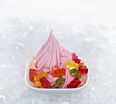 Strawberry yogurt ice cream garnished with gummy bears