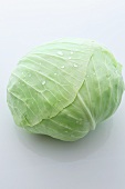 A cabbage with drops of water