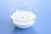 Natural yogurt in a glass bowl