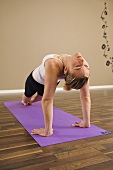 Young woman doing a yoga excercise