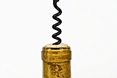 Corkscrew in Wine Bottle; White Background