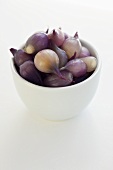 Bowl of Organic Red Baby Onions
