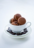 Chocolate macaroons in a cup