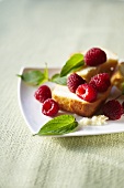 Piece of Pound Cake with Fresh Raspberries and Pineapple Sage