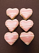 Pink heart biscuits filled with jam