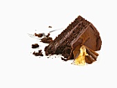 A piece of chocolate cake, partially eaten