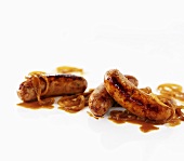 Cumberland sausages with onion sauce