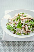 Bowl of Rice Salad with Mushrooms and Peas