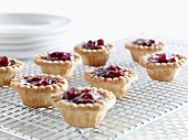 Cranberry tartlets on a wire rack