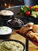 Chicken wings with various dips